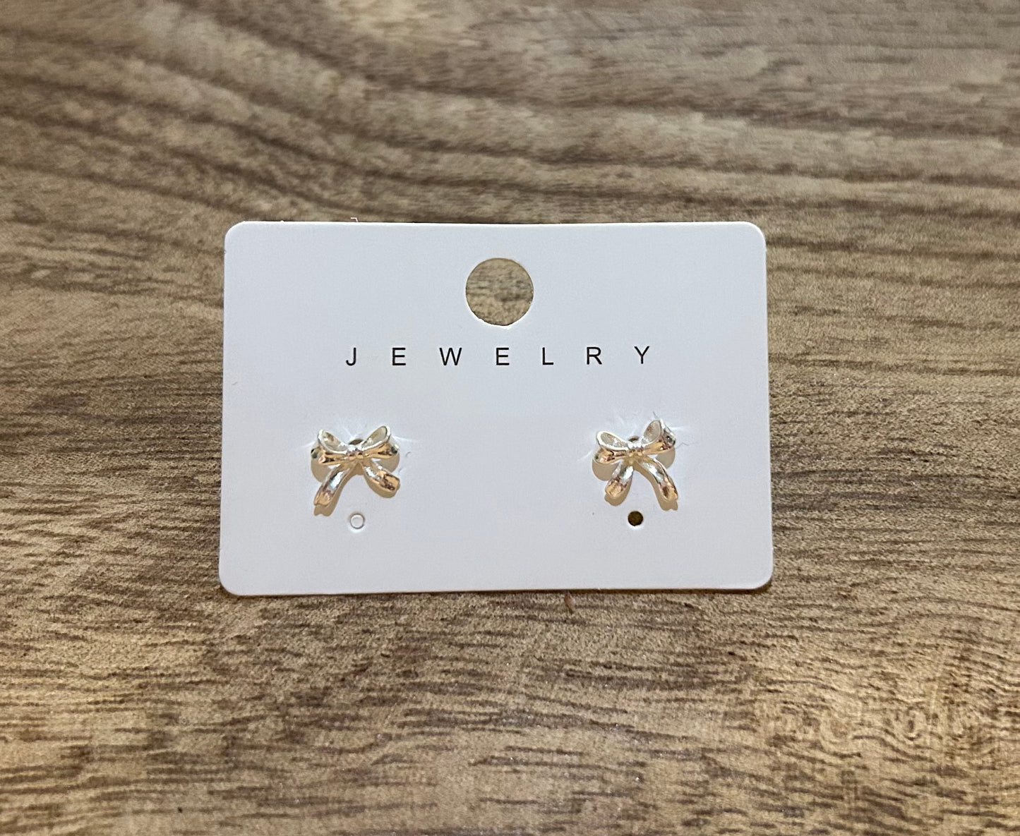 Silver stud bow earrings