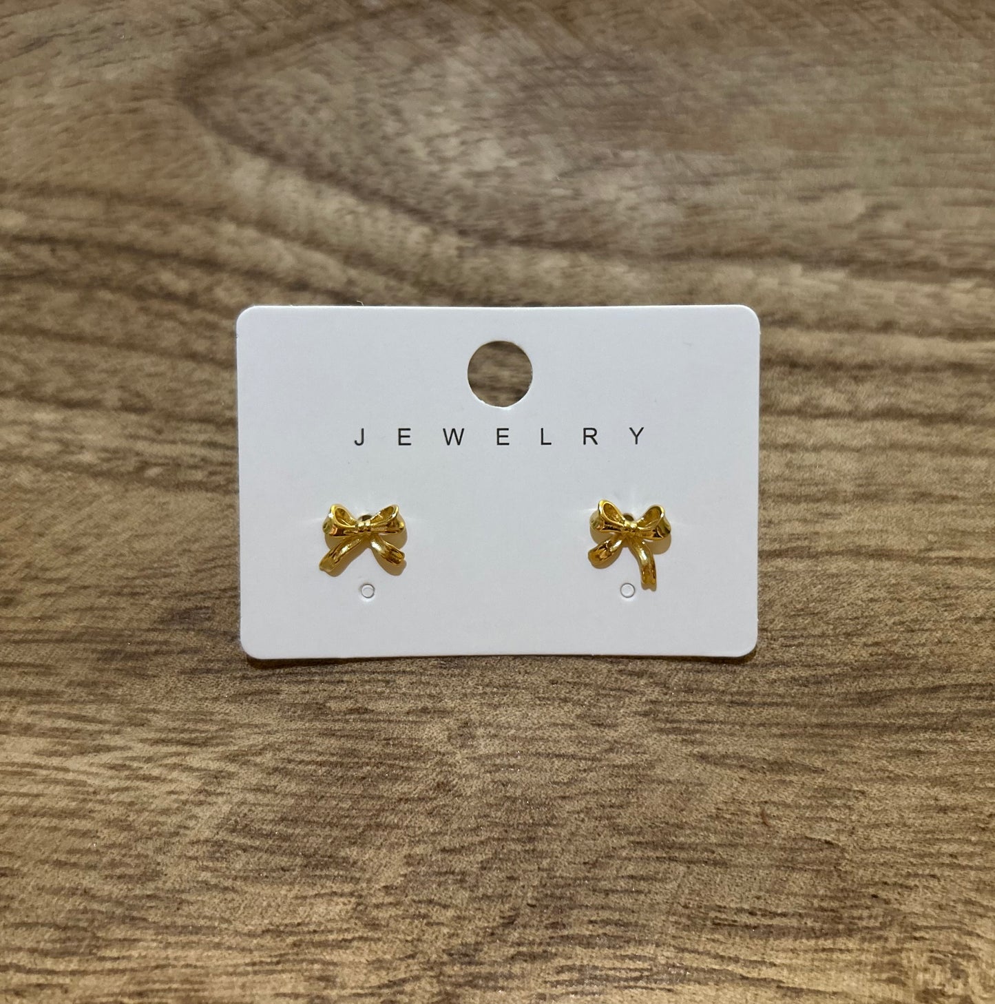 Gold stud bow earrings